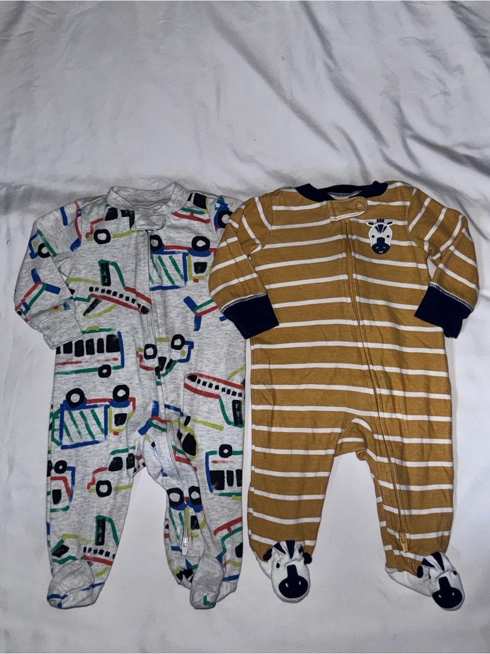 Carter's size 3 months Mustard Stripe and Multi-Vehicle Footed One-Pieces bundle